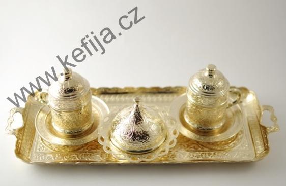 Rytinami zdobená sada v barvě zlata