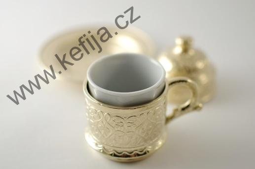 Rytinami zdobená sada v barvě zlata